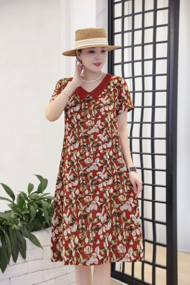 夏季新款娃娃领棉花气质显瘦遮肚时尚中长款连衣裙