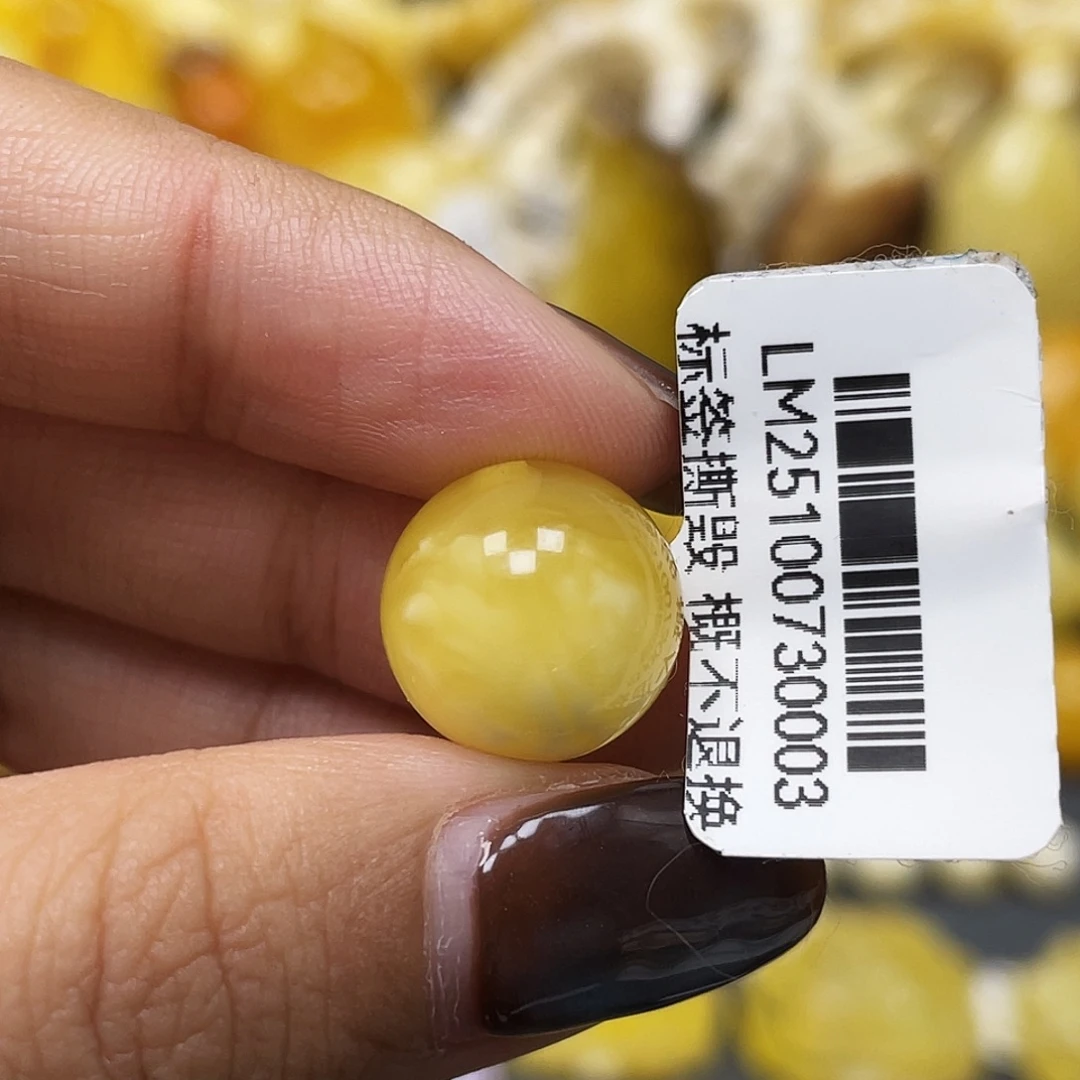 蜜蜡未镶嵌裸石12.8mm白飘花