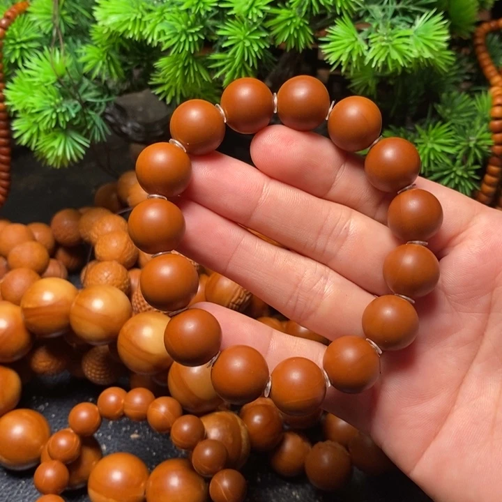 橄榄核手串1.4红料光珠