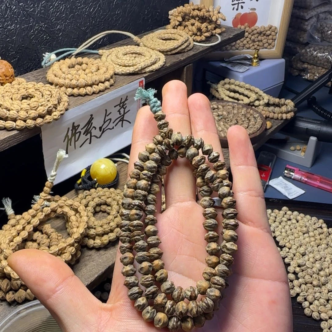 莎***事柏香籽/百香籽吊坠