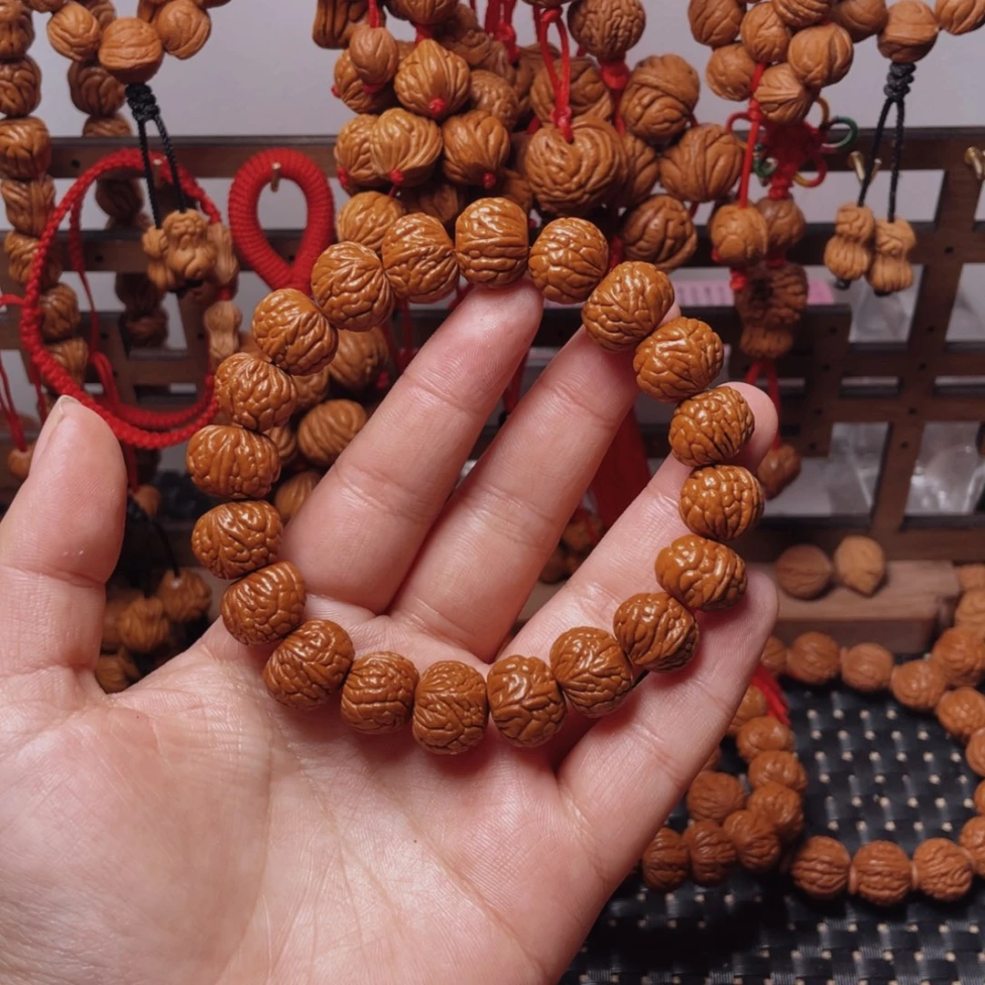 木质类龙纹桃枭手串