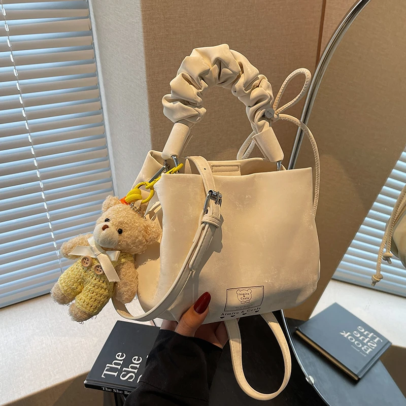 艾米兔 X COOLE女包2025新款潮流百搭通勤简约手提单肩斜挎水桶包