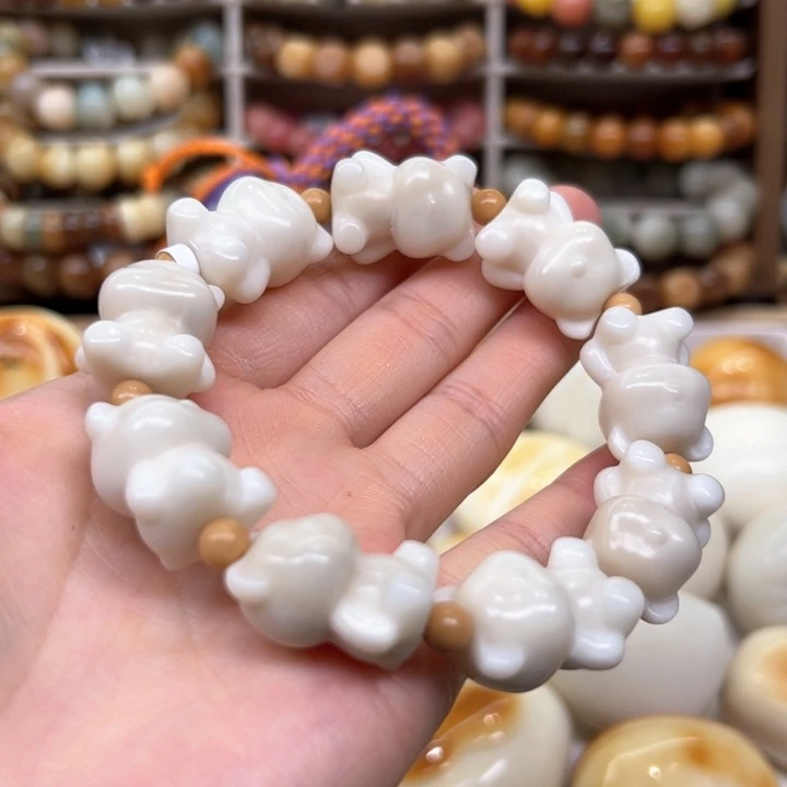 白玉菩提把件2.5.53象牙果原果小熊