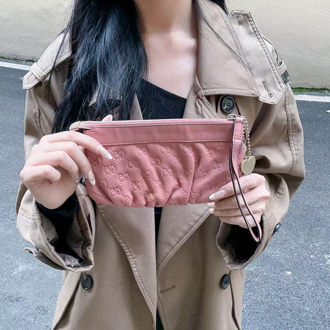 95新 GUCCI/古驰 95新gucci粉色手拿包81153309