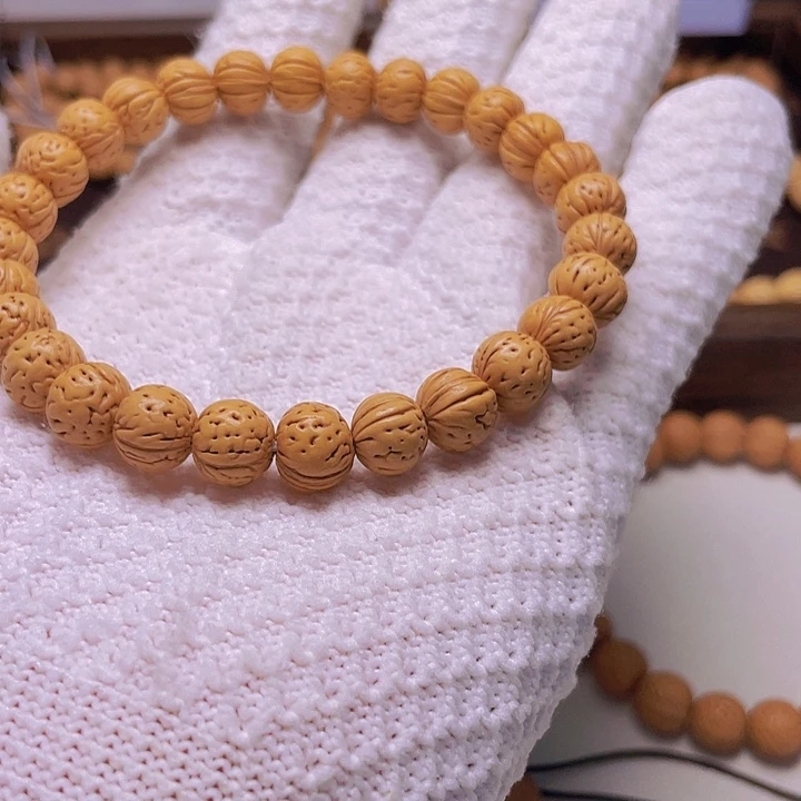 男***店核桃木/黑胡桃（胡桃木）9+野生桃核手串