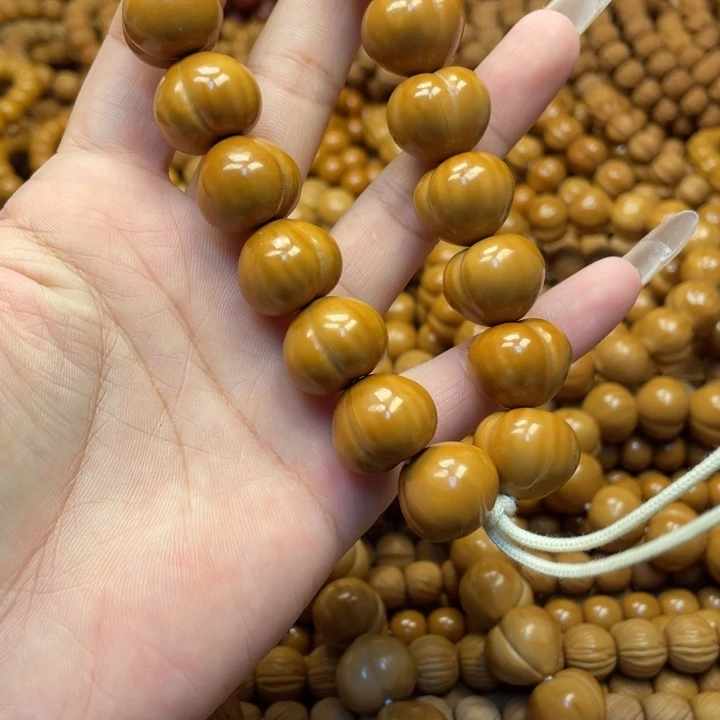 一***壳核桃微瑕亮面屁桃手持