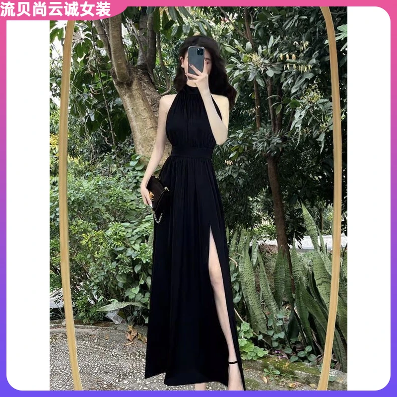 高级感黑色挂脖无袖连衣裙女2025夏季法式气质开叉收腰长裙子