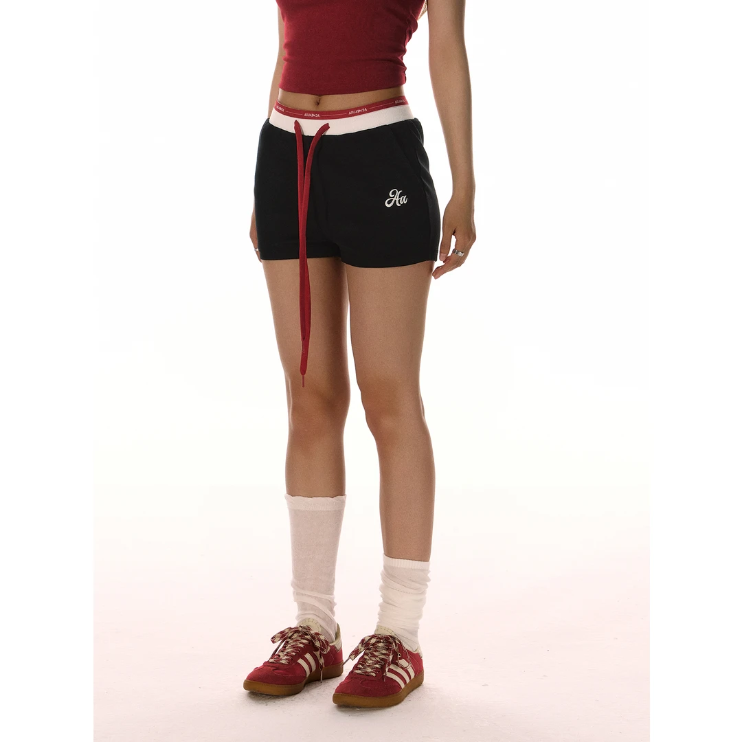 ACMEAURA腰部撞色logo刺绣抽绳运动舒适包臀短裤