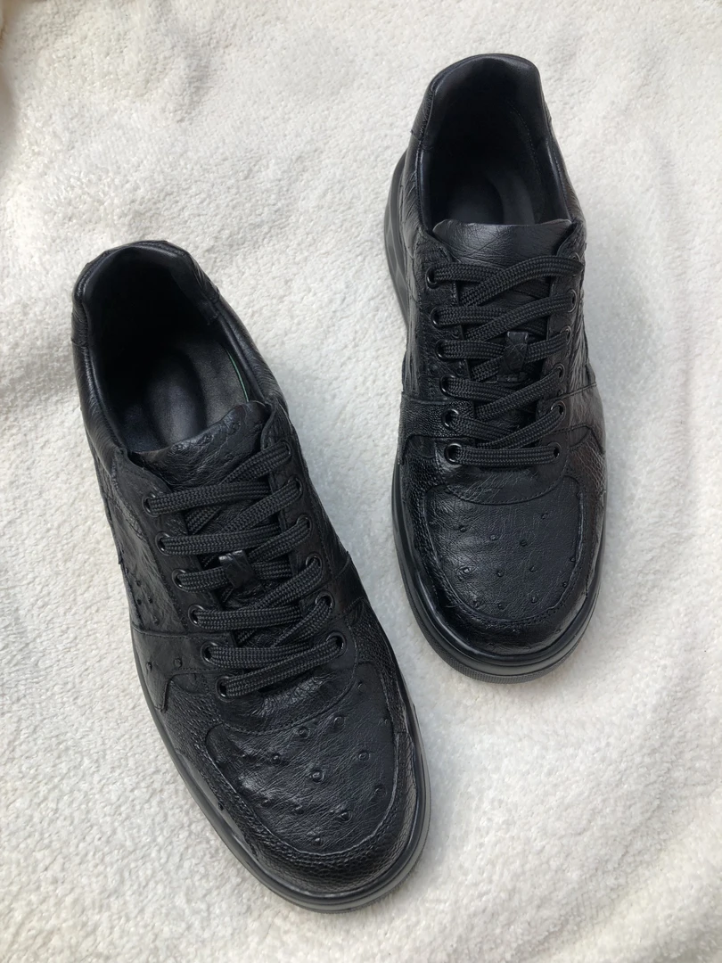 鸵鸟真皮休闲皮鞋板鞋时尚男鞋新款百搭男士运动透气休闲鞋黑色