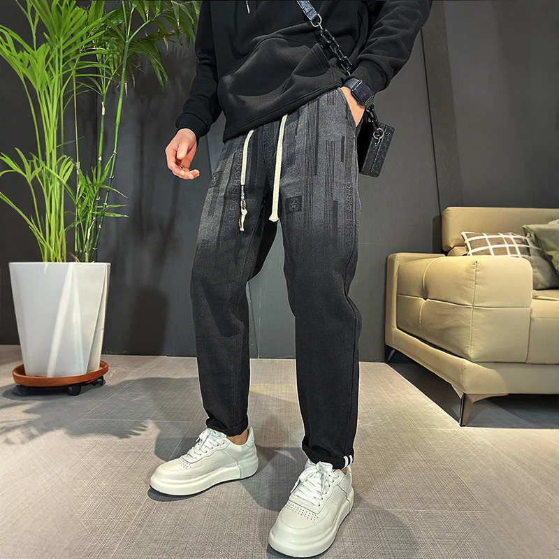 秋冬新款时尚提花男士牛仔裤潮流百搭宽松弹力直筒裤小脚休闲长裤