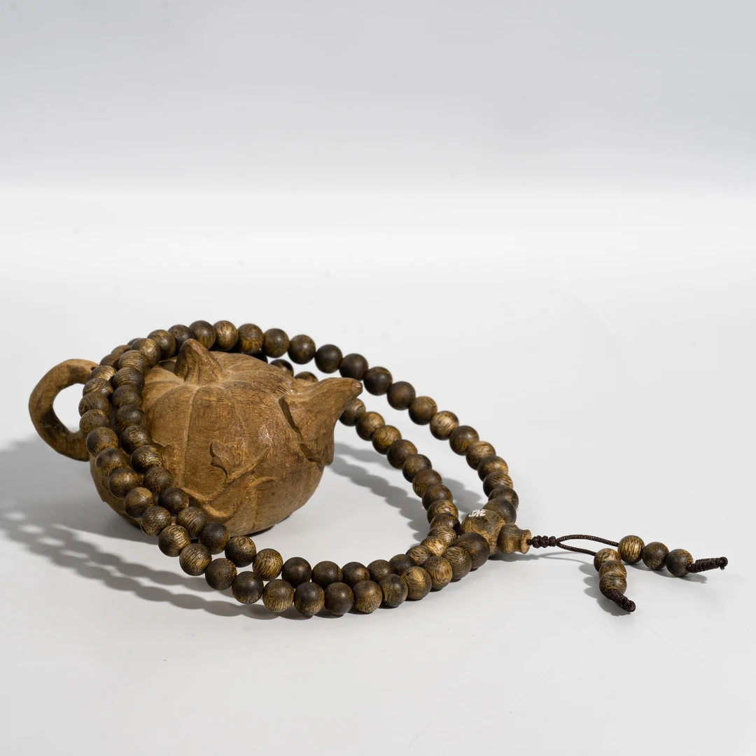 【新年款】海南莺歌绿棋楠/95分沉/乌身三圈手串