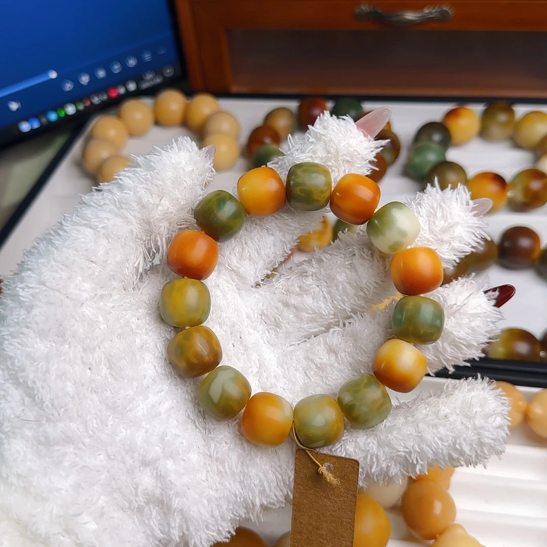 菩提根/象牙果手串玉**丶卡16干磨花皮微微瑕