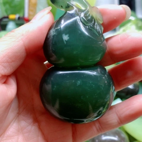未镶嵌蛇纹石玉手把件