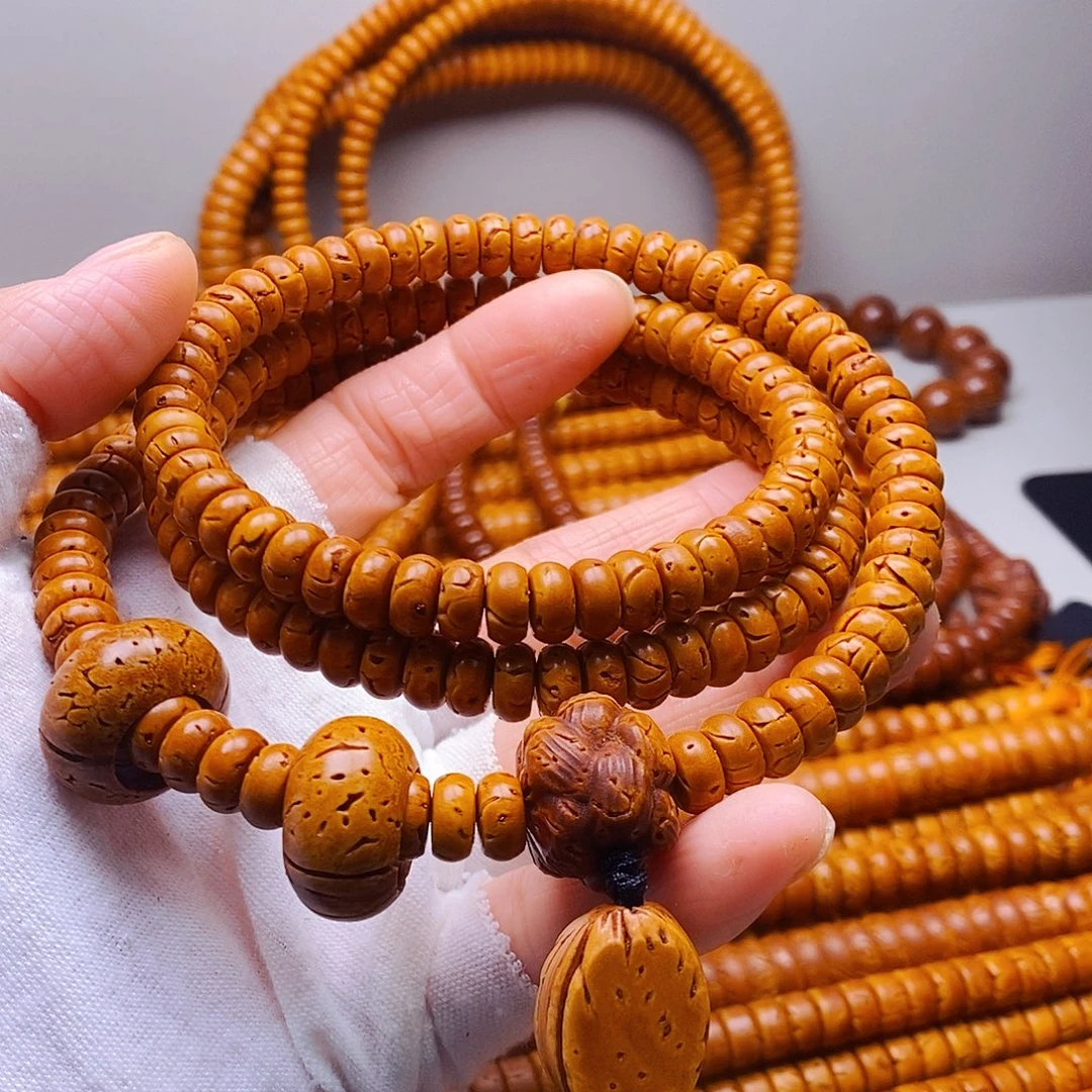 桃核吊坠4乘8核片脖挂微瑕疵100