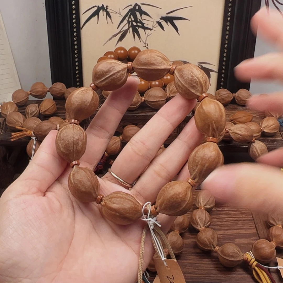 张***.橄榄核手串20.25梅林铁核