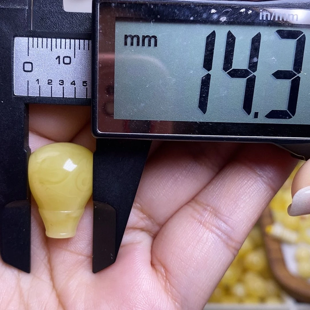 裸石琥珀未镶嵌.****k蜜蜡三通