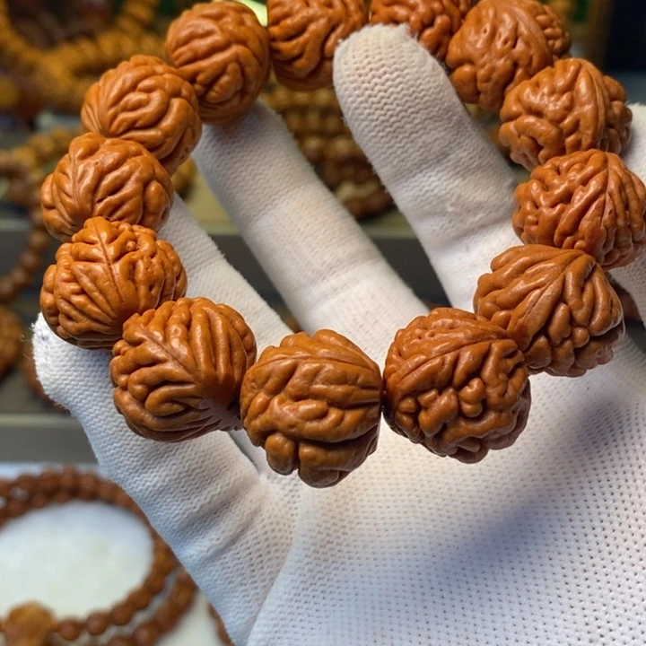 桃核手串艾***你秦岭龙纹桃核