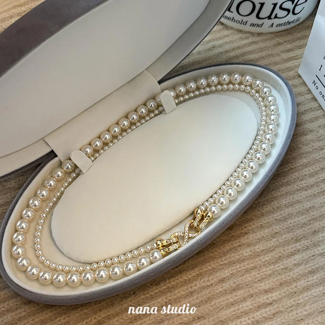 金色8字扣双层叠戴珍珠项链女款2025新款锁骨链轻奢高级感毛衣链