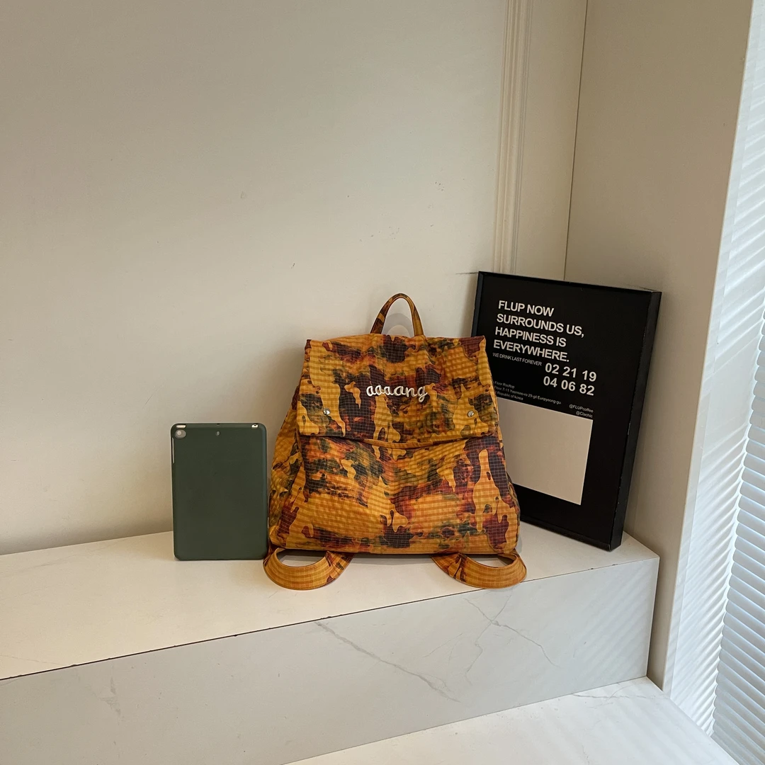 拉链双肩包个性字母工装风透气印花桶包复古洋气护脊