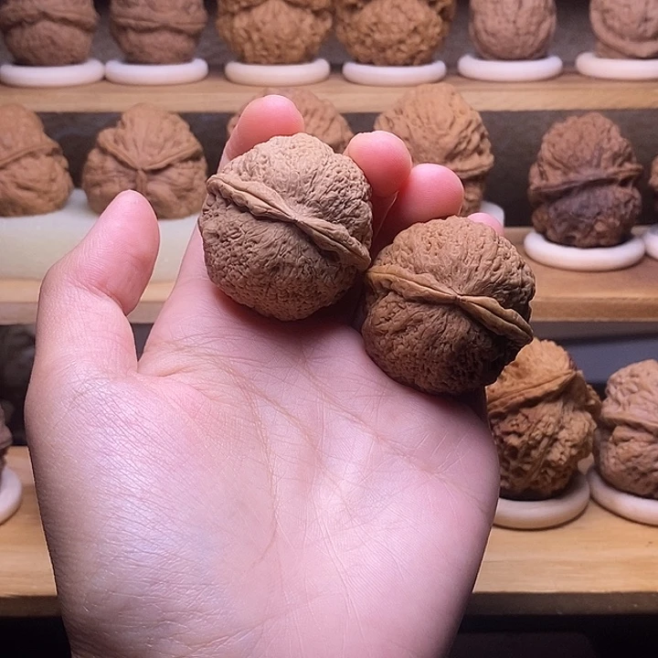 桃核把件1 两棱