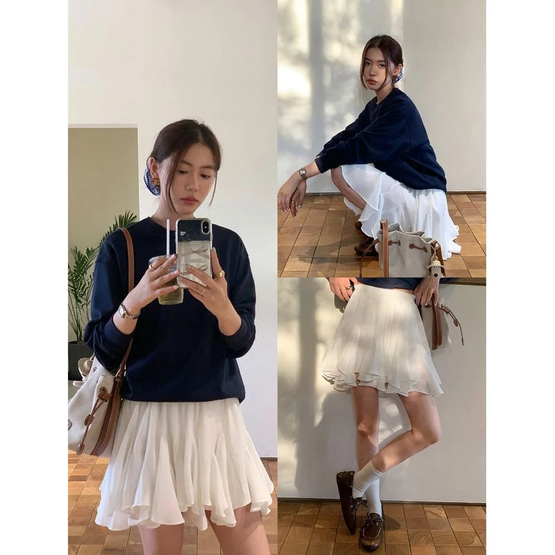 白色a字蓬蓬裙半身裙女2025春季减龄高腰显瘦设计感不规则短裙子