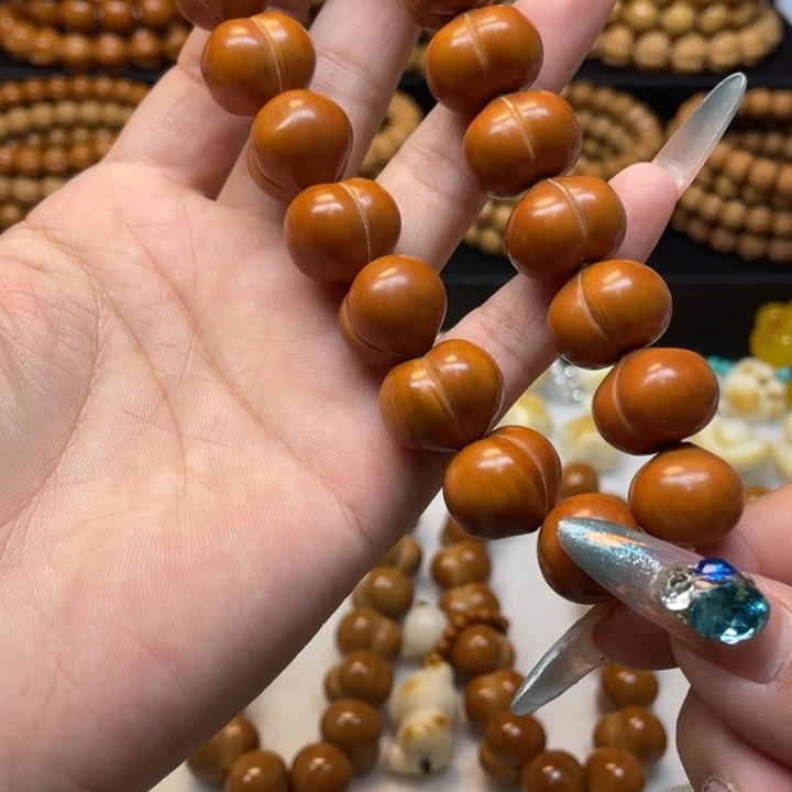 高***边猴头核桃手串微瑕屁桃