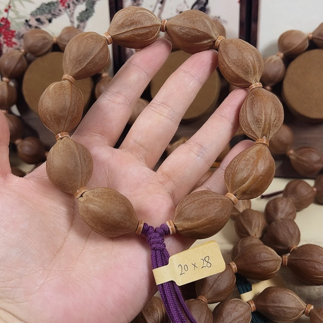 叫***吧橄榄核手串梅林铁核20.28橄榄核