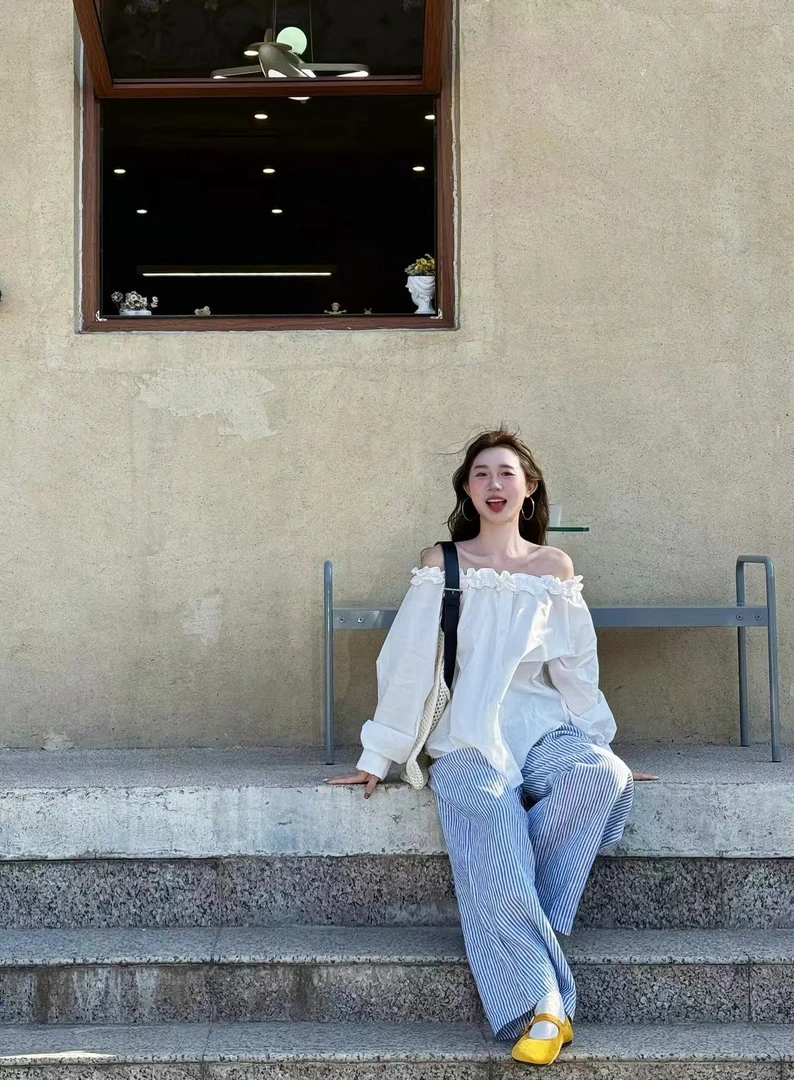法式一字领露肩收腰衬衫2025新款初春设计感小众上衣女百搭休闲裤