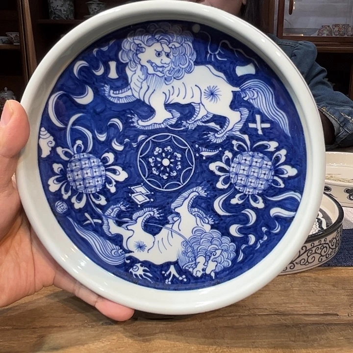 瓷壶承蓝地白花壶承