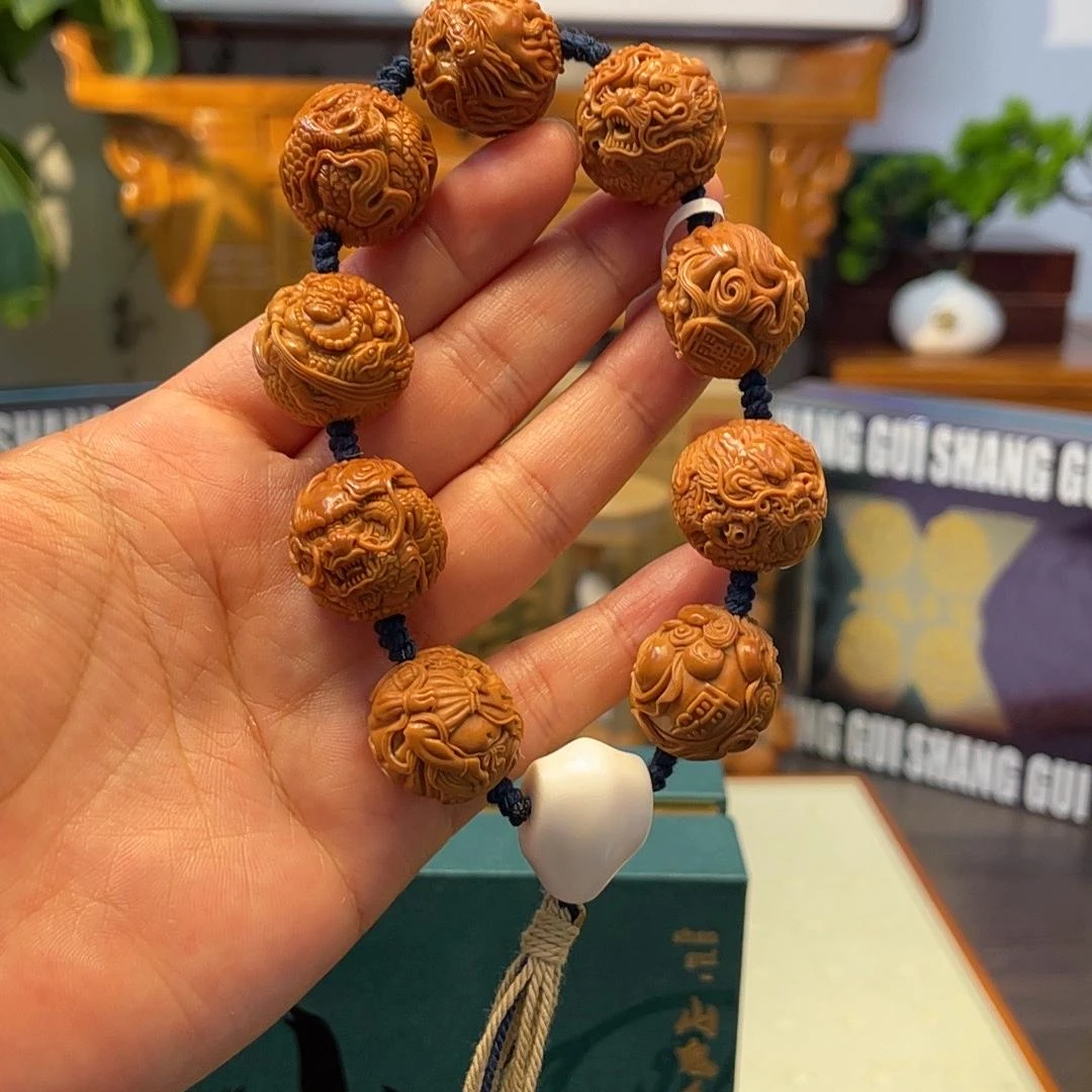 翟娟手作风雨雷电橄榄核核雕纯手工