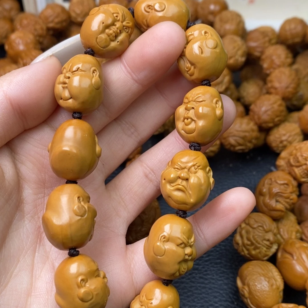 橄榄核吊坠.****醉橄榄核人生百态