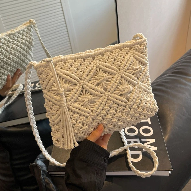 小挎包大容量针织水桶包包女2025新款小众感镂空编织洋气斜挎小包