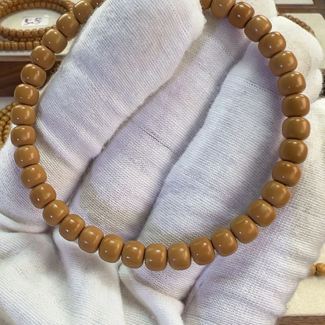 手串橄榄核6.0mm老挝老型单圈微白