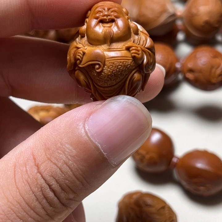 闷***儿手串橄榄核财神爷