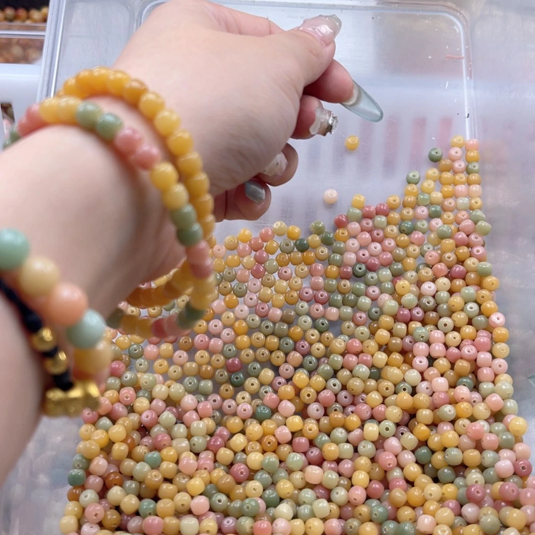 白玉菩提吊坠q5*6mm/100+10颗多宝桶珠