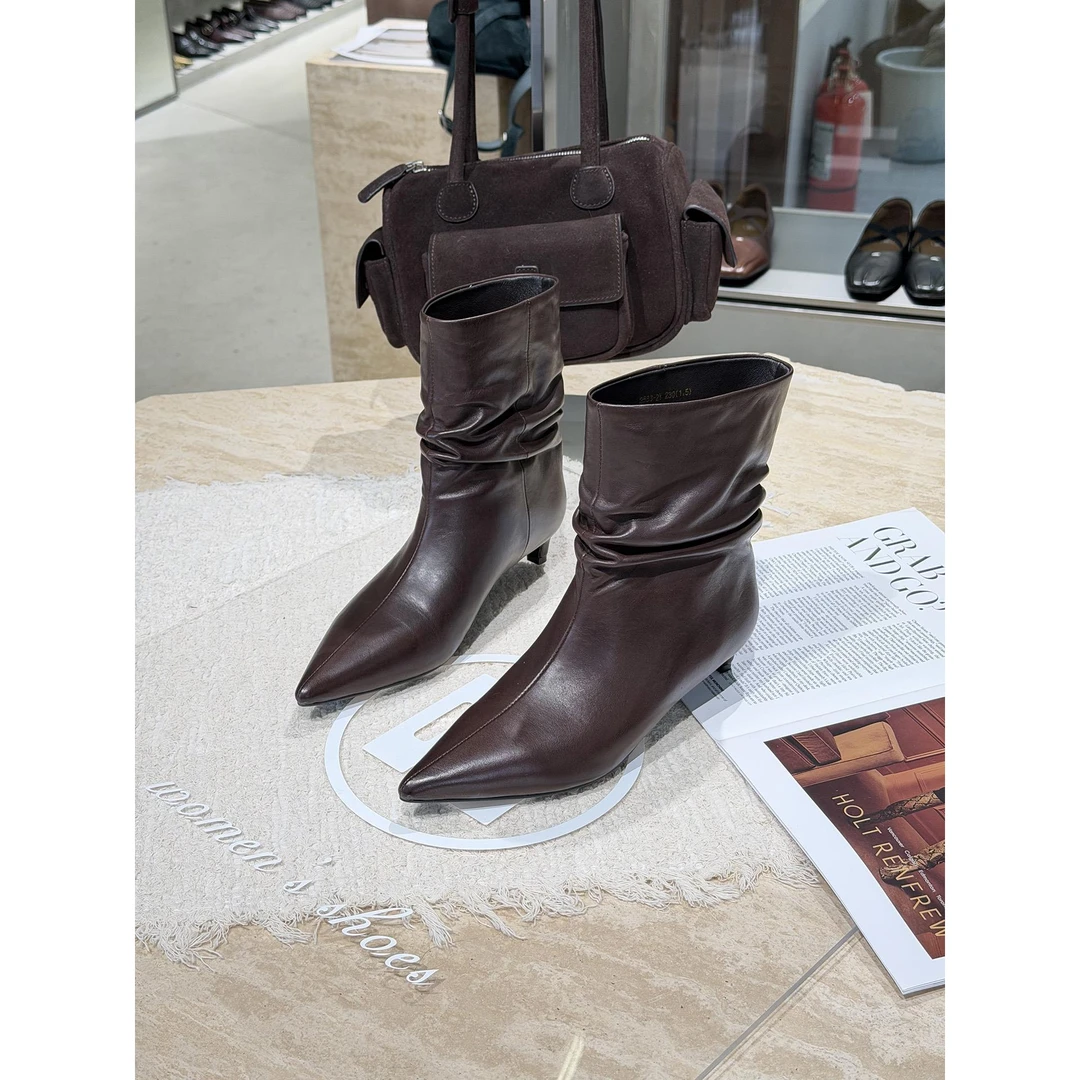 欧洲站女鞋2025年秋冬新款复古中跟尖头高跟鞋女真皮堆堆靴时装靴