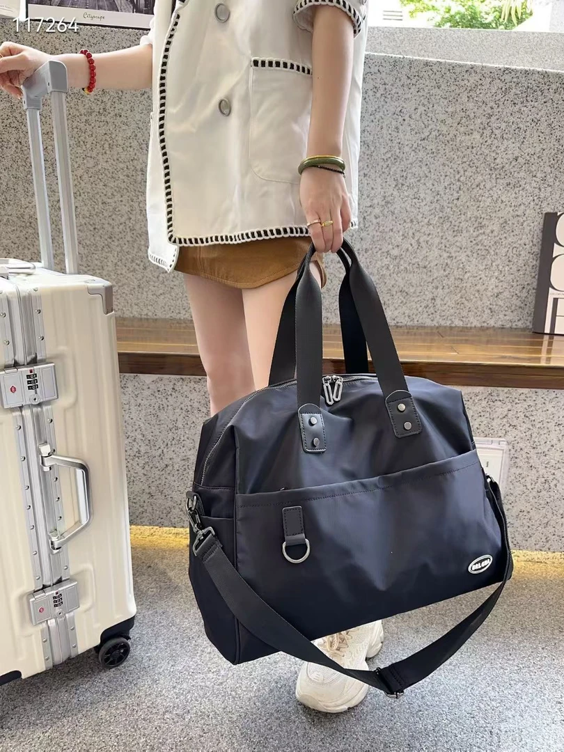 新美艺品牌时尚潮流休闲运动背提包男女通用旅游包