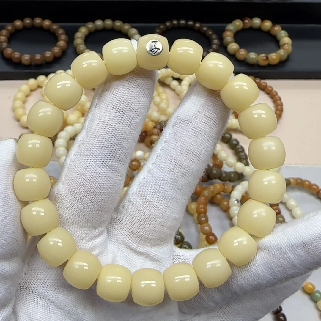 菩提根/象牙果手串10*11 鬼工 10年 鼓珠