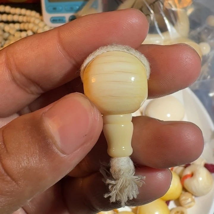 玫***雨吊坠菩提根/象牙果