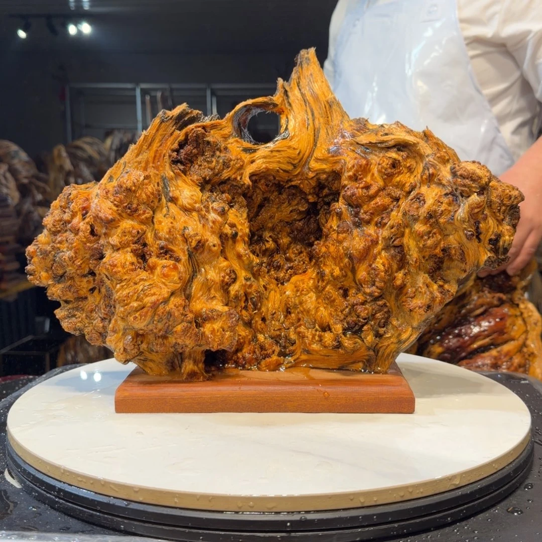 快***钢木王一刀琥珀木摆件48