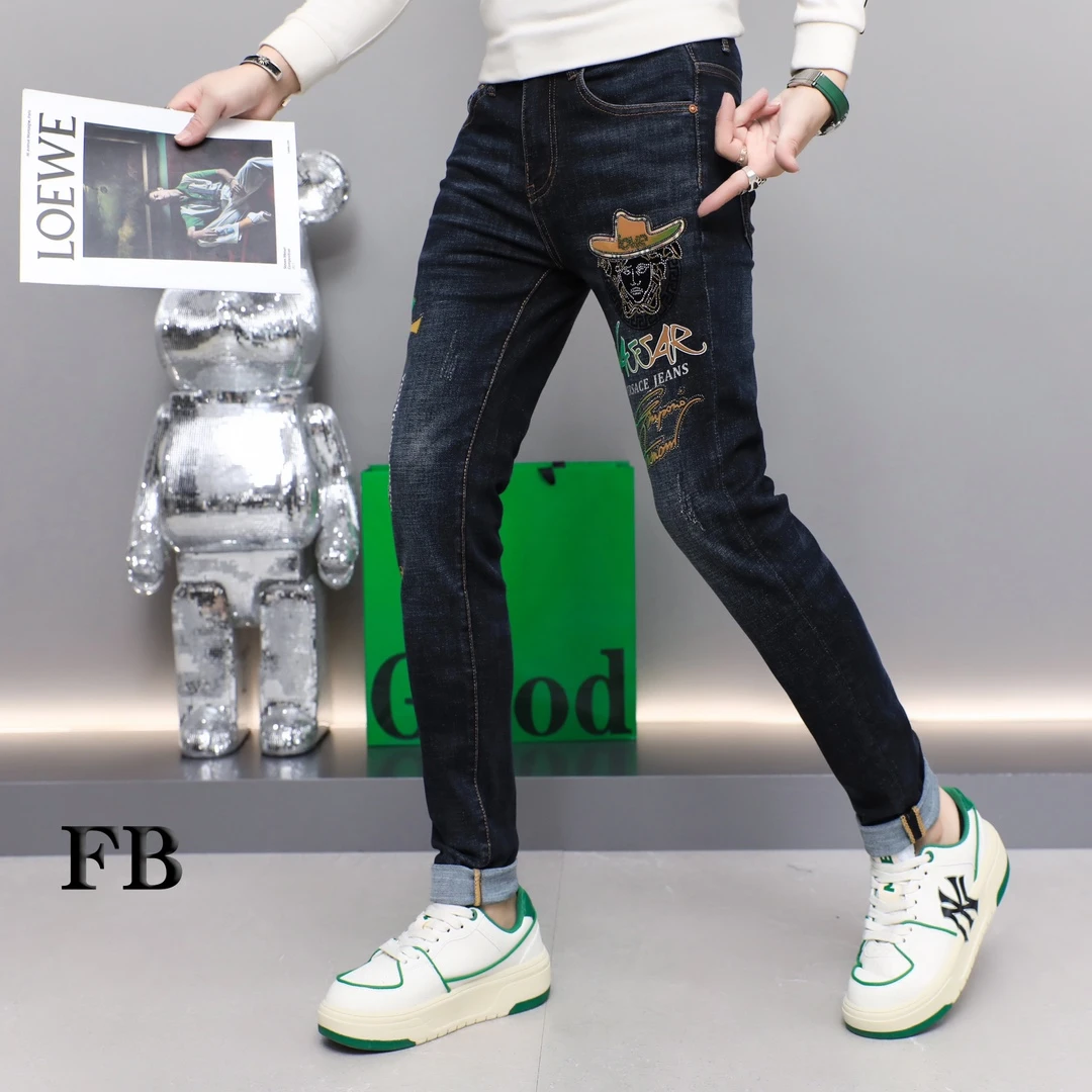 9005秋季新款时尚男士修身烫钻修身小脚牛仔裤