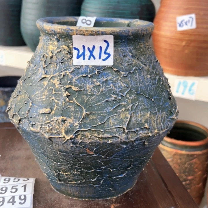 16.8-1微瑕土陶飞碟兰金