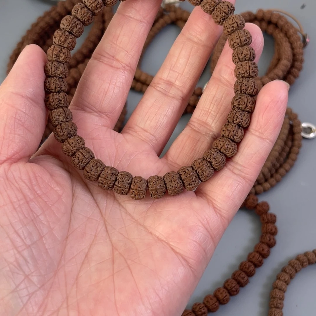 金刚菩提吊坠藏切梅花手串