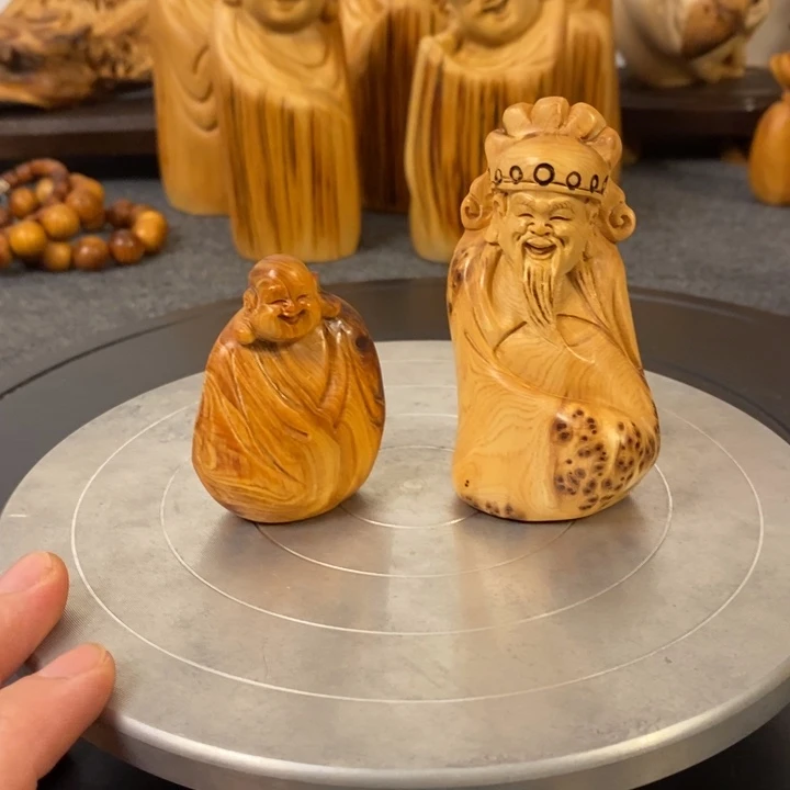 柏木（崖柏）软****记弥勒佛手把件财神留疤