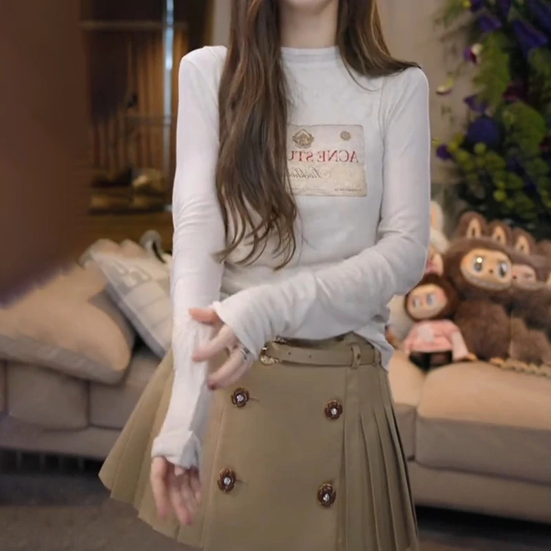 韩系百搭圆领印花长袖针织衫2025夏季薄款修身显瘦设计感洋气上衣