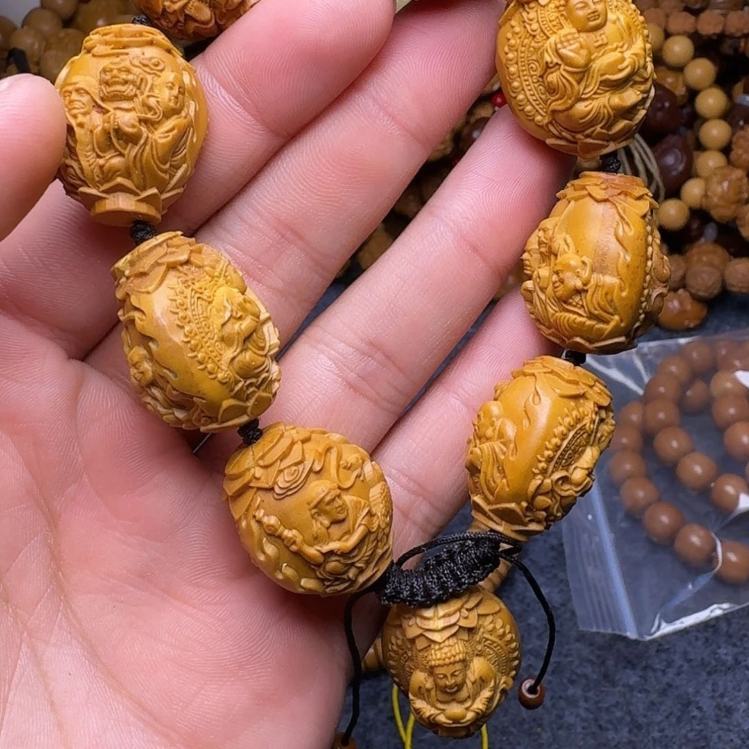 橄榄核手串退还给