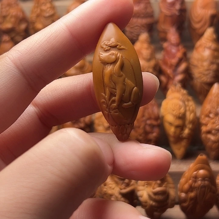嘉***洛吊坠橄榄核橄榄核
