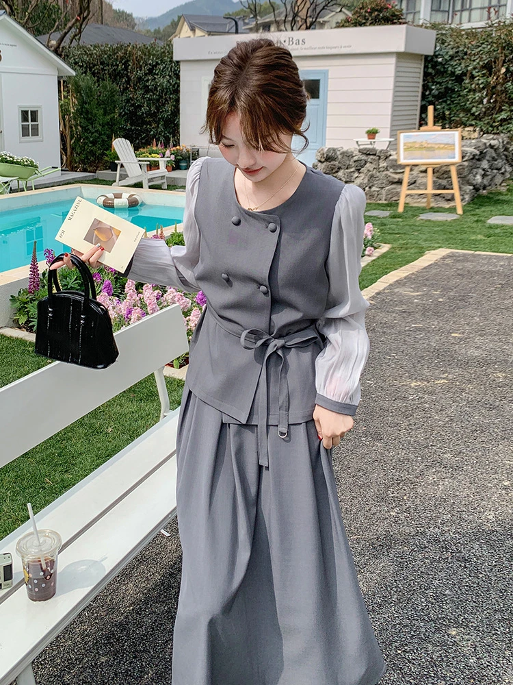 【小众设计2025超火春装一整套穿搭假两件衬衫拼接上衣半身裙女