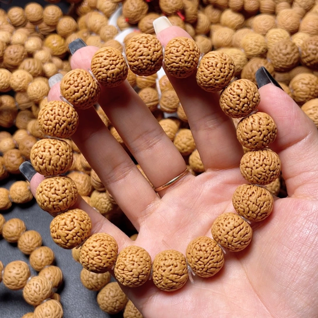 人***W桃核手串蚂蚁柳叶