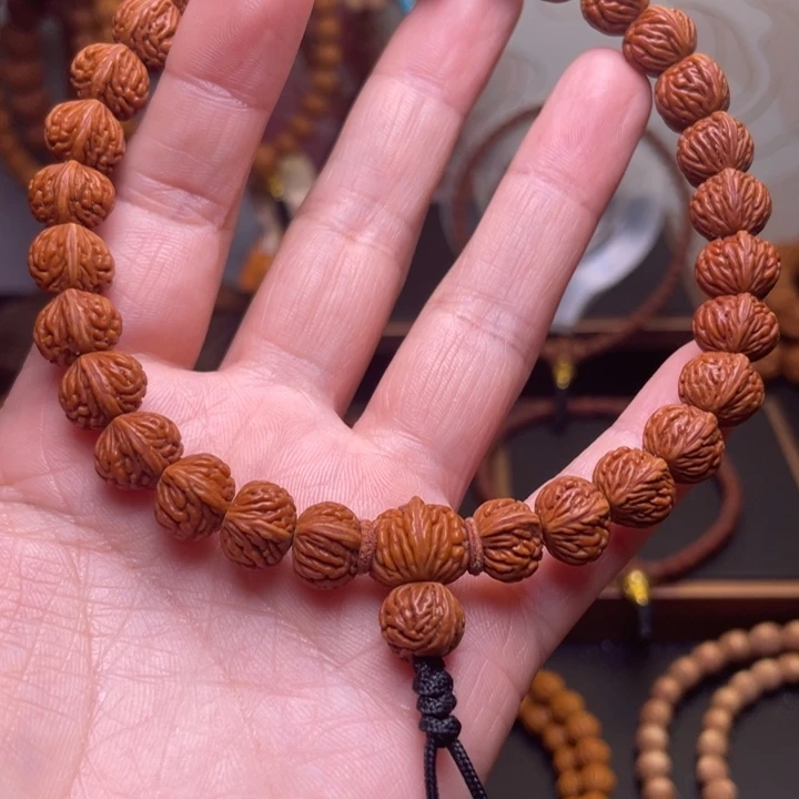 掌***印桃核吊坠龙文桃核